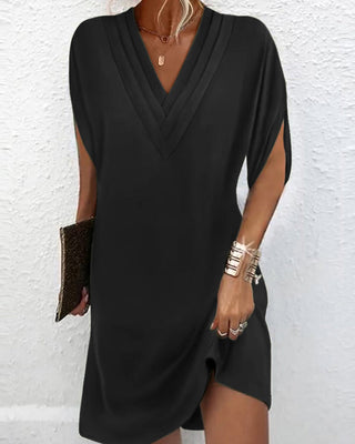 Jansen | Vestido elegante con mangas divididas unidas 1